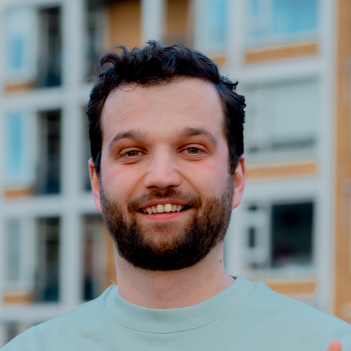 Ivan Jovanovikj smiling outdoors